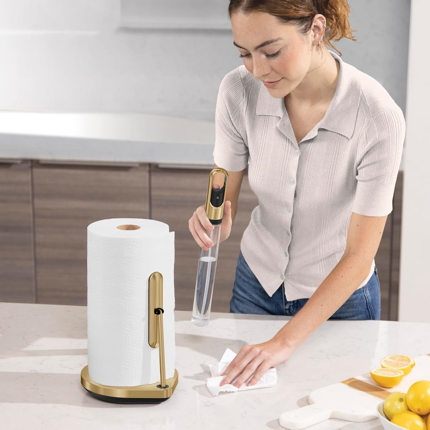 image:imagesimplehuman Paper Towel Holder with Spray AllinOne Countertop Paper Towel and Cleaner Dispenser 6 oz Refillable Pump OneHanded Tear Weighted Base BrassBrass Stainless Steel