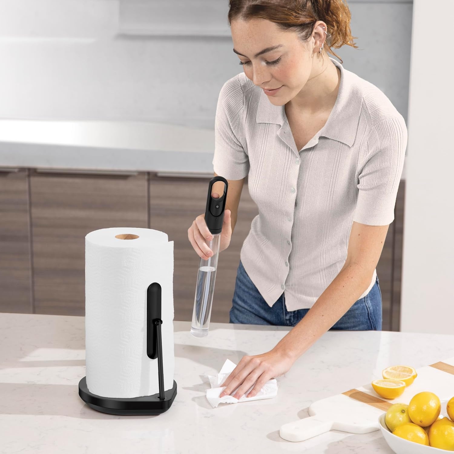 image:imagesimplehuman Paper Towel Holder with Spray AllinOne Countertop Paper Towel and Cleaner Dispenser 6 oz Refillable Pump OneHanded Tear Weighted Base BrassBlack Stainless Steel